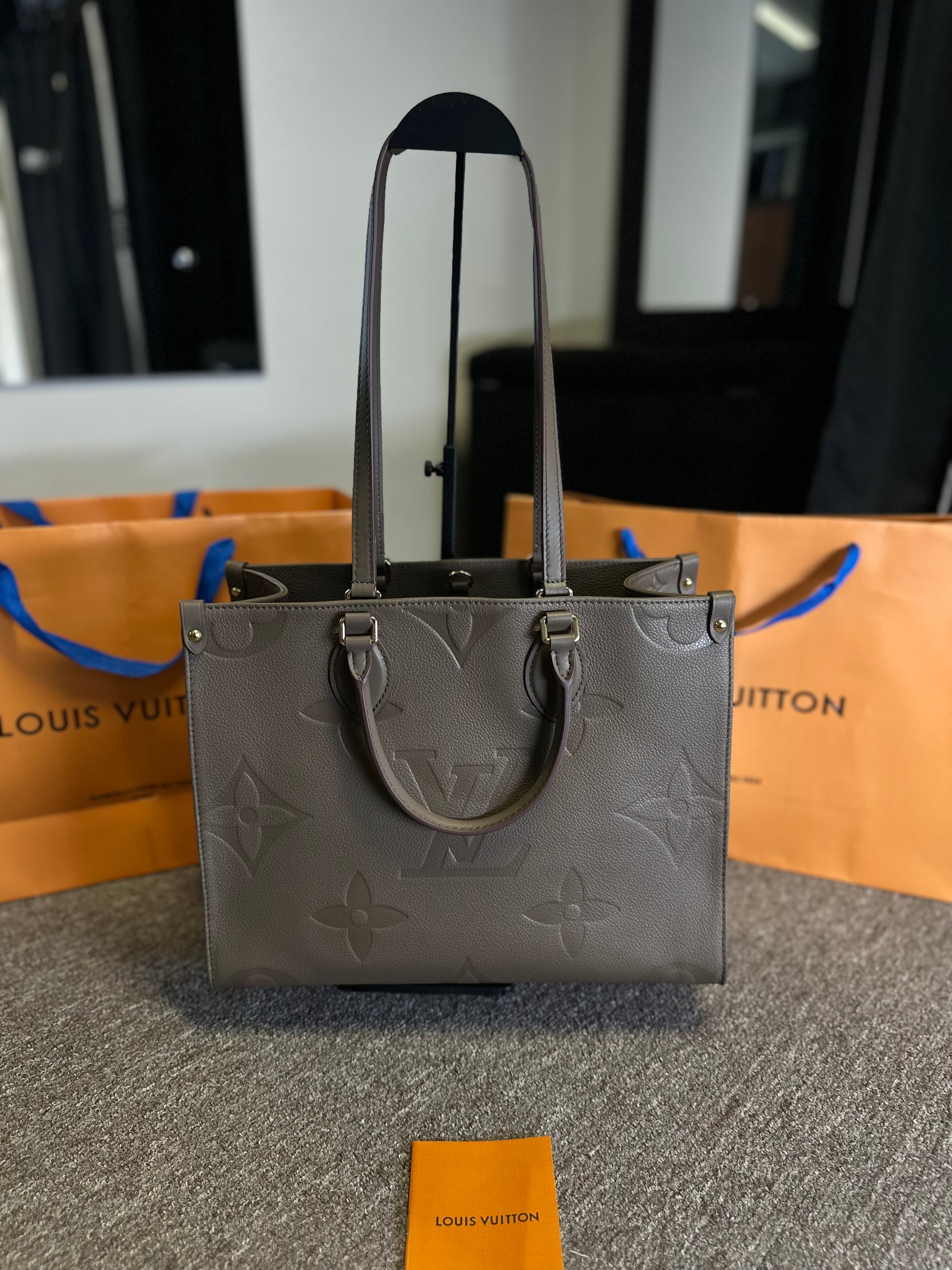 Bolsa LV OnTheGo - Couro Monogram Empreinte